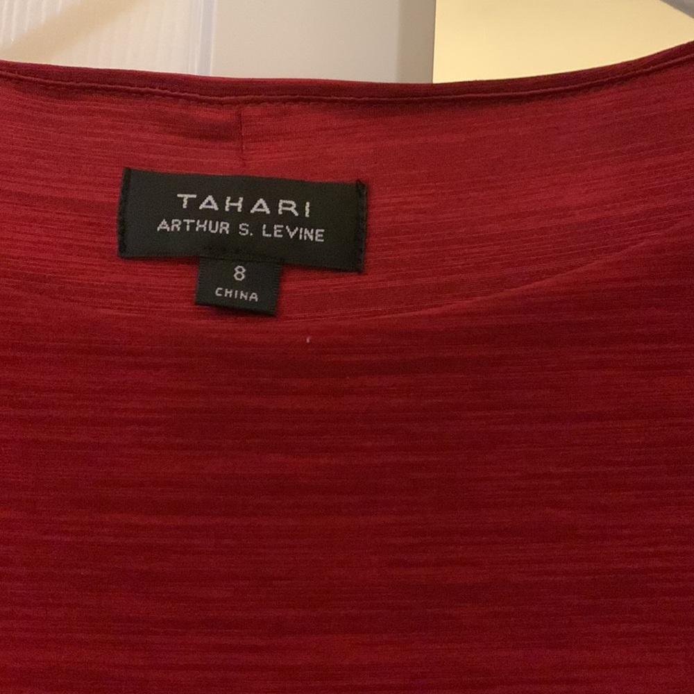 Thari Arthur S. Levine pettie dress size 8 , red color , used two times .